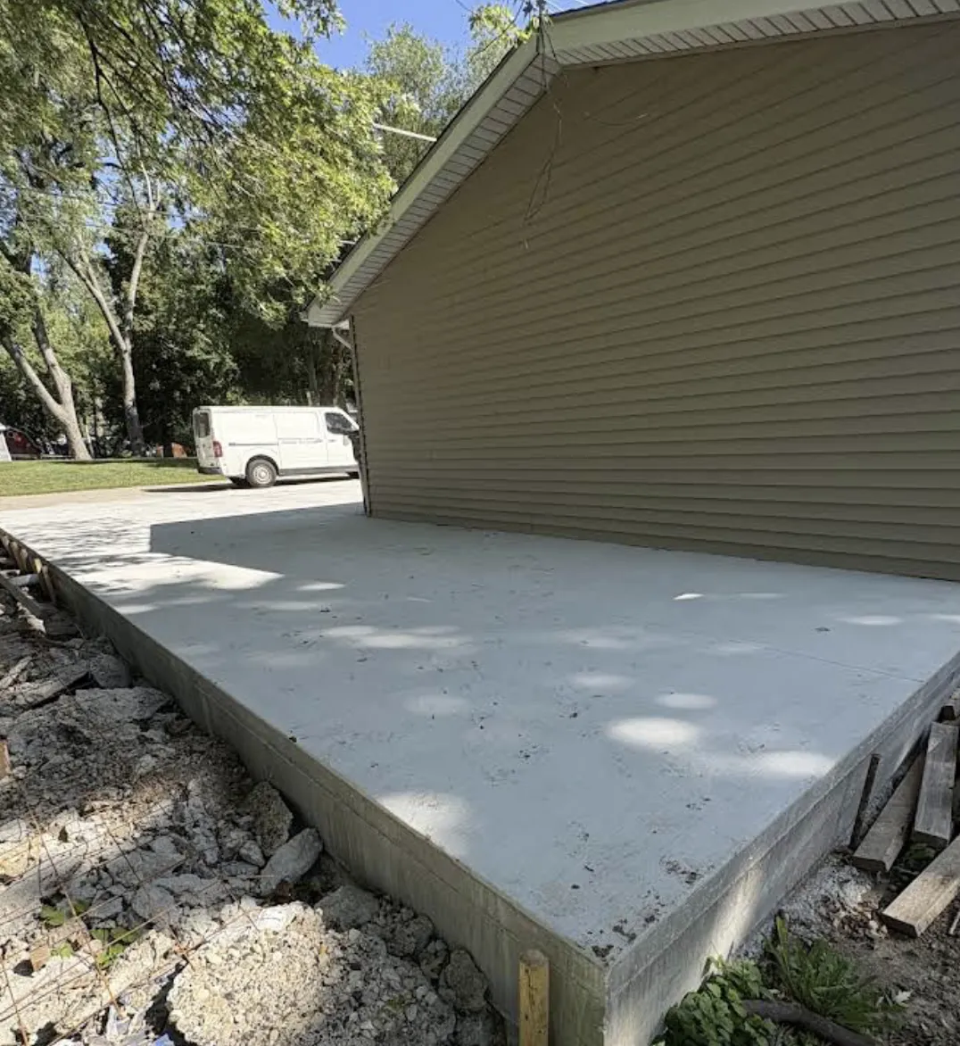 Two-car concrete driveway with expansion joints in Wauconda IL